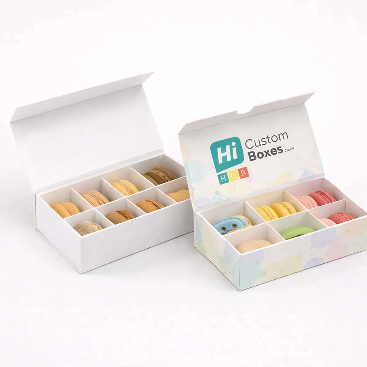 Two open magnetic gift boxes with dividers- showcasing plain white and branded pastel dot designs- class=